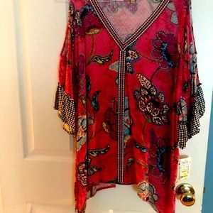 Woman’s new with tags size large kerchief style top with cut out shoulder